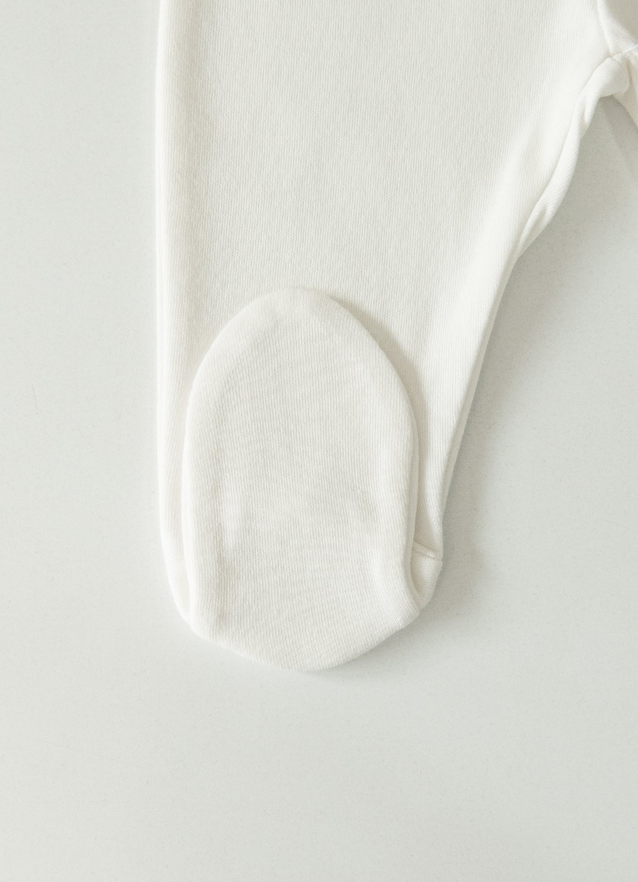 Organic New Basic Hose mit Füßchen Weiß Ecru