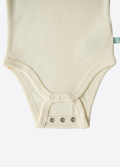 Organic New Basic Verlängerbares Kurzarm-Body Cremeweiß